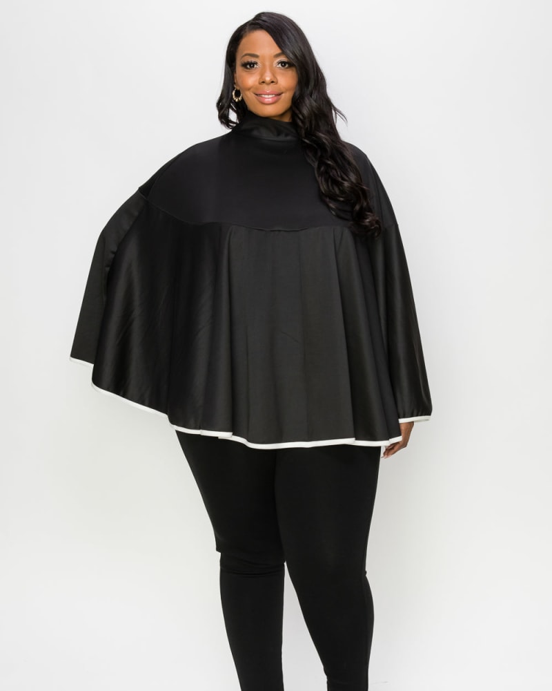 Front of a model wearing a size 1X Lisa Cape Poncho in Black by L I V D. | dia_product_style_image_id:241062